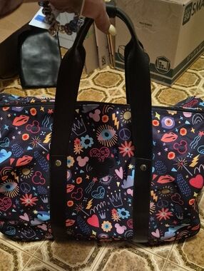 Disney/ Bioworld  Black Multicolor Icon Print Duffle With Wheels New Without Tag